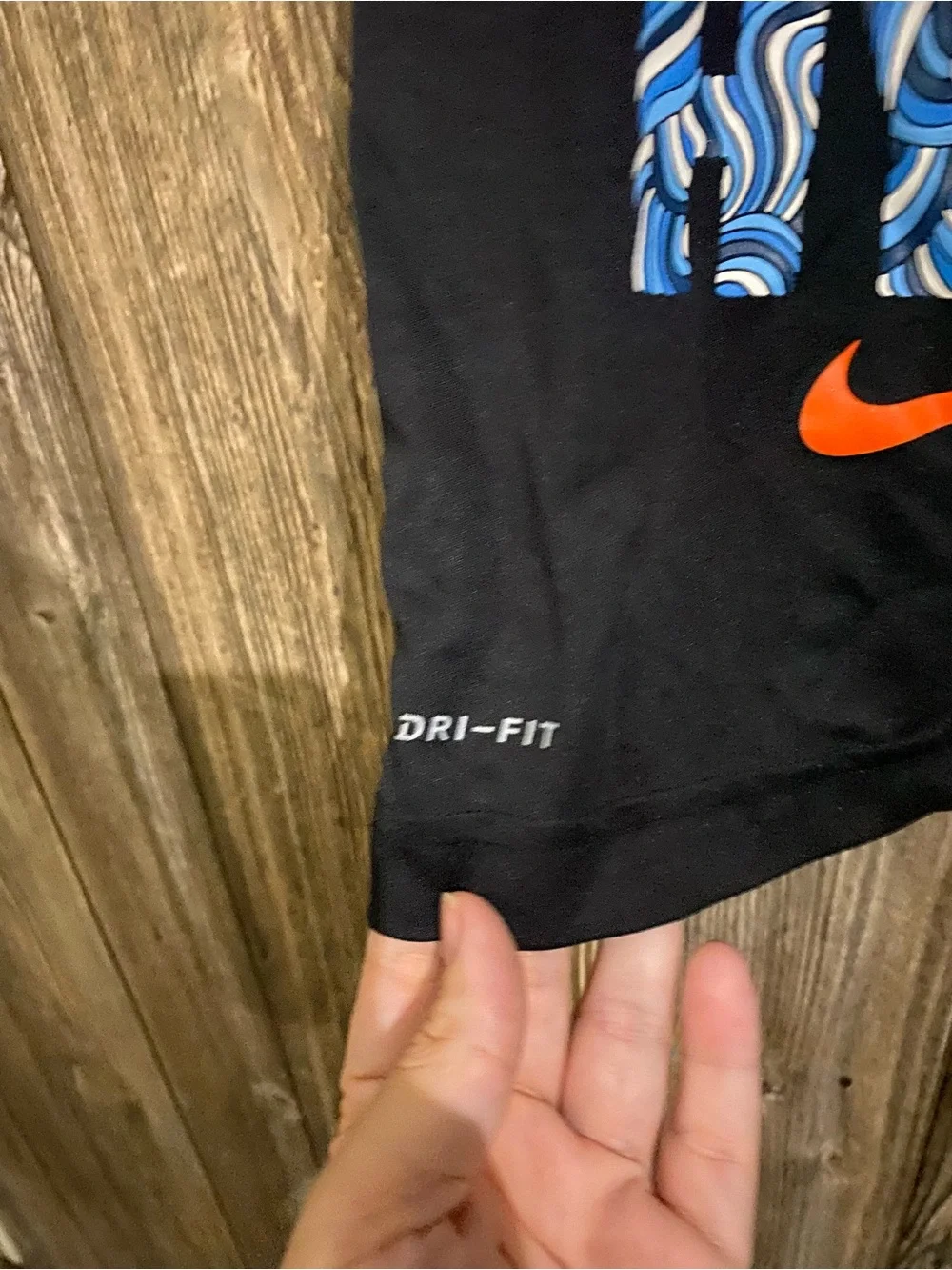 Nike Black Short-Sleeve Tee with Blue Graphic and Orange Swoosh